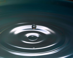 water droplet causing ripples